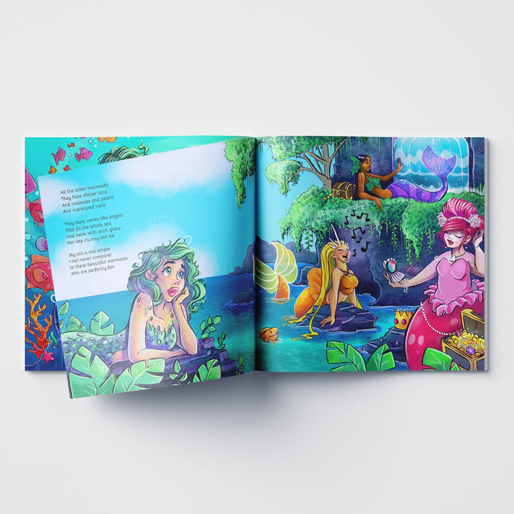 Inside spread from children's book Little Envy of a mermaid lagoon